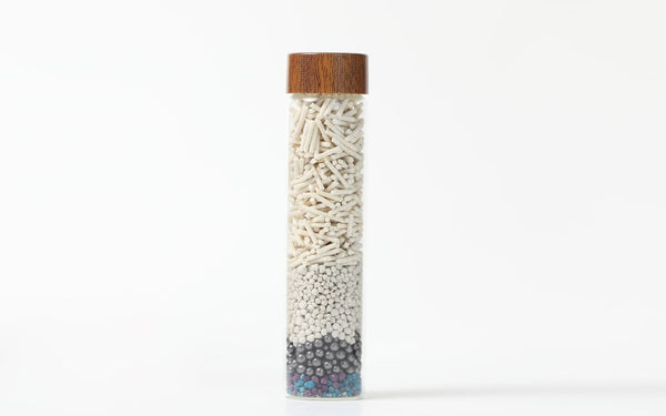 Tofu cat litter in a glass vial — tofu vs crystal cat litter honest comparison for Canadians