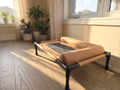 Breeze Cot by a sunlit window — morning light lifestyle view