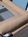 Close-up of the rolled bolster corner and double-stitched seams in sand vegan leather